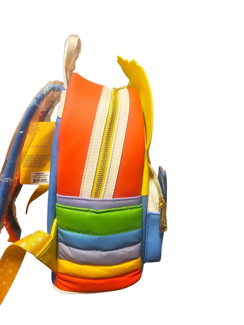 Loungefly Rainbow Brite Yellow Character Kids Backpack with Multicolor Accents